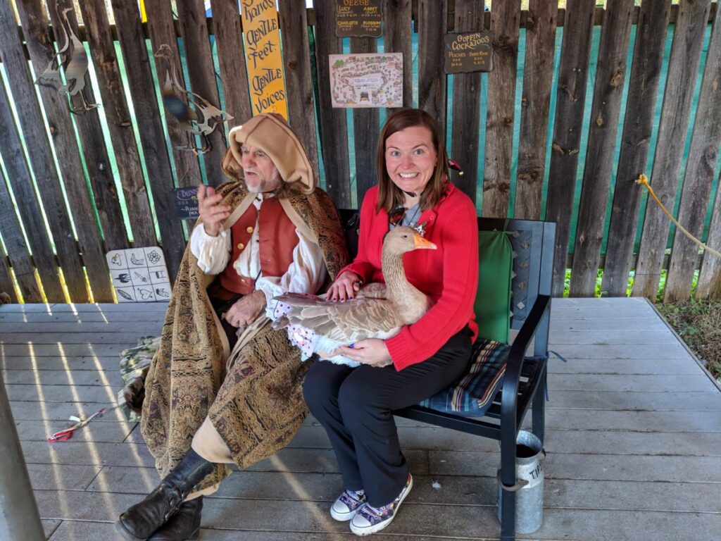 Cheryl posing with Mother and Father Goose at the Carolina Renaissance Festival, 2018
